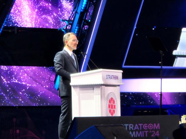 Professor Fahrettin Altun Head of Communications for the Presidency of Türkiye addresses the audience at STRATCOM 2024 emphasizing the dual nature of AI as both an opportunity and a challenge during the forums opening on December 13 in Istanbul AJP Park Sae-jin