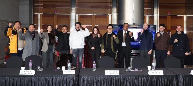 The cast and production team of Again 2024 Turandot pose for photo during a press call at COEX in Seoul on Dec 17 2024 From left Kim Sang-jin Han Myung-won Juliana Grigoryan Park Hyun-joon Yusif Eyvazov Donata DAnnunzio Lombardi Kim Sung-jin Luiz-Otavio Faria Davide Procaccini Murat Guvem and Giacomo Medici AJP Han Jun-gu