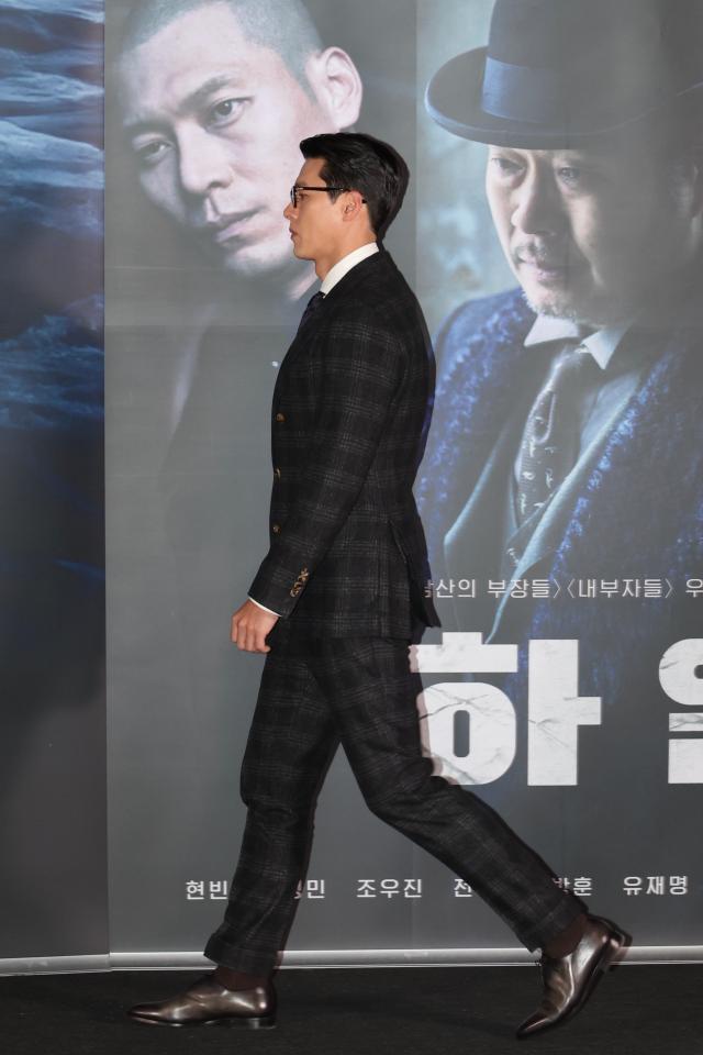 Actor Hyun Bin enters a press conference for Harbin at CGV Yongsan in Seoul Dec 18 2024 AJP Han Jun-gu