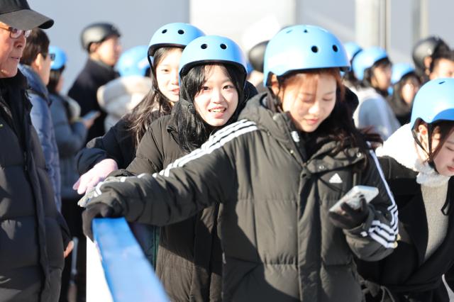 Visitors enjoy ice skating at Seoul Plaza in Seoul Dec 23 2024 AJP Han Jun-gu