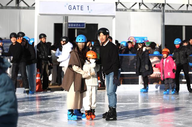 Visitors enjoy ice skating at Seoul Plaza in Seoul Dec 23 2024 AJP Han Jun-gu