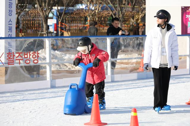 Visitors enjoy ice skating at Seoul Plaza in Seoul Dec 23 2024 AJP Han Jun-gu