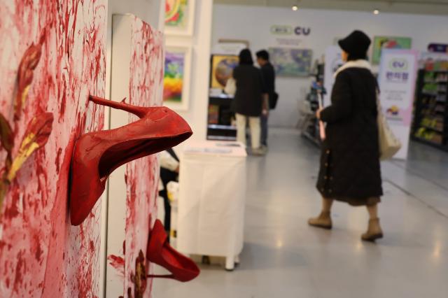 Visitors view artworks at the Art Show at COEX in Seoul Dec 26 2024 AJP Han Jun-gu