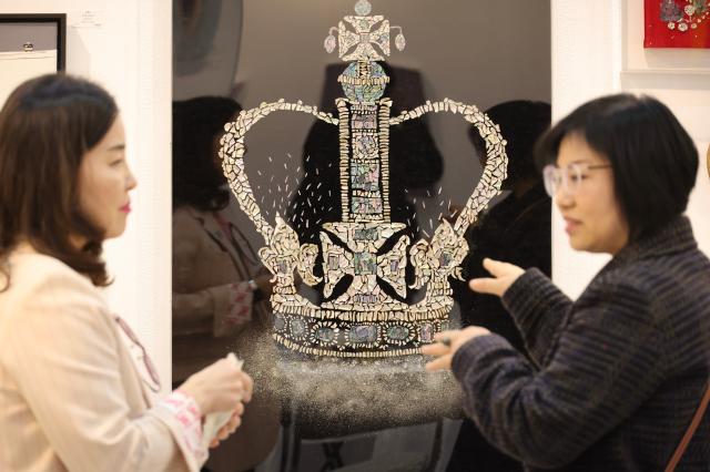 Visitors view artworks at the Art Show at COEX in Seoul Dec 26 2024 AJP Han Jun-gu