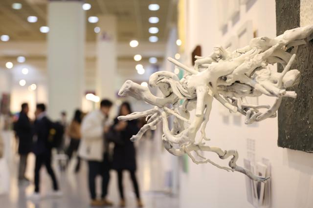 Visitors view artworks at the Art Show at COEX in Seoul Dec 26 2024 AJP Han Jun-gu