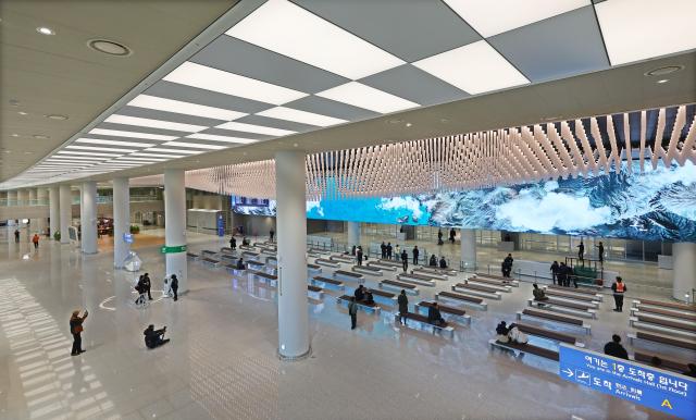 Travelers stroll in Incheon Airport Terminal 2 Dec3 2024 Yonhap