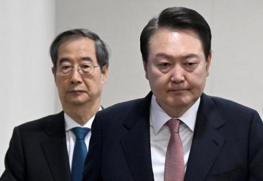 韩国民众近七成认定尹锡悦涉嫌内乱 超半数支持弹劾韩德洙