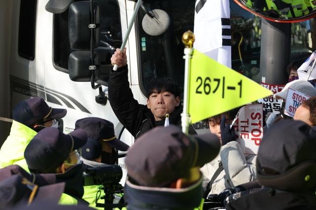 Police officers control protesters at a rally near the Presidential residence in Hannam-dong Seoul on Jan 2 2025 AJP Han Jun-gu