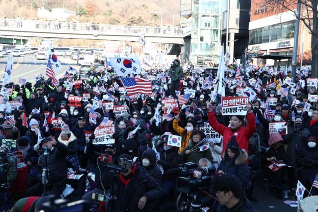 Die-hard supporters of President Yoon Suk Yeol gather for a rally near his official residence in Hannam-dong Seoul on Seoul on Jan 3 2025 Yonhap