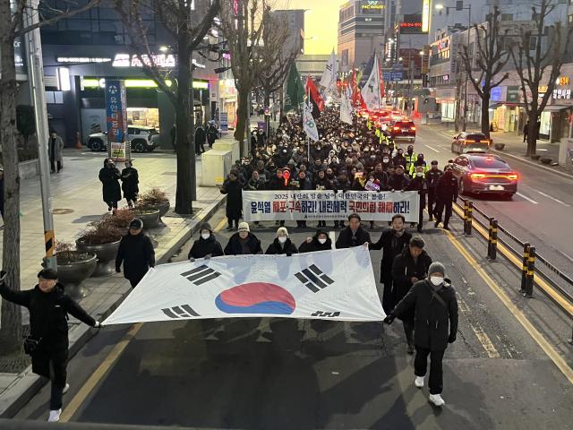 A rally calling for the immediate arrest of President Yoon Suk Yeol takes place in Geumnam-ro Gwangju Jan 4 2025 Yonhap