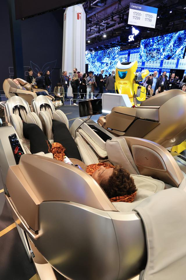 A visitor tries out a dancing massage chair at Bodyfriends exhibition booth at CES 2025 Las Vegas Convention Center Jan 8 2025 Yonhap