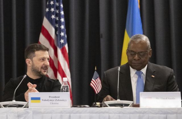 Ukrainian President Volodymyr Zelensky left and US Secretary of Defense Lloyd Austin attend a meeting of the Ukraine Defense Contact Group at Ramstein Air Base in Germany on Jan 9 2025 AP-Yonhap