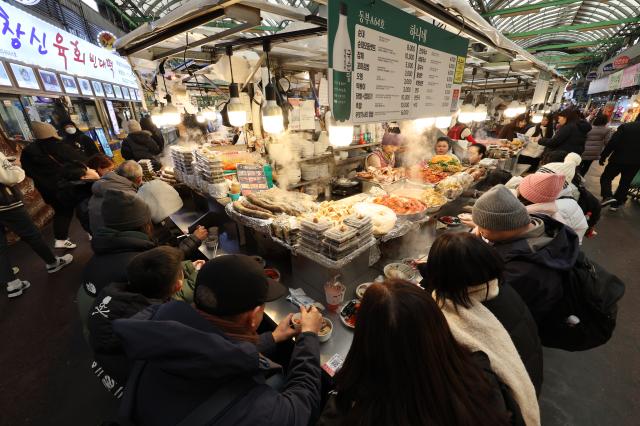 Food stalls in Gwangjang Markets food alley AJP Han Jun-gu