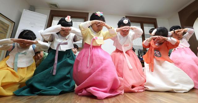 PHOTOS: Children learn traditions of Lunar New Year festival