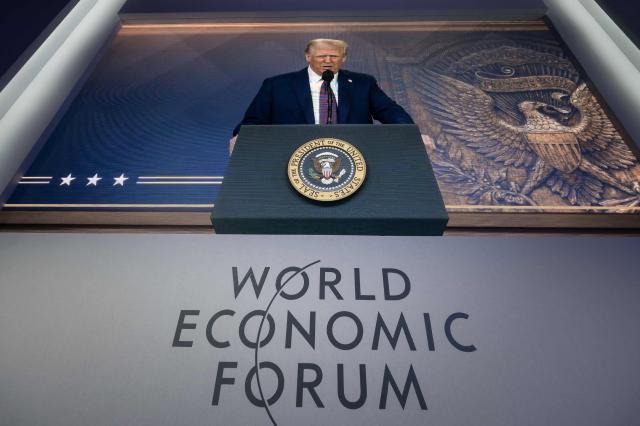 A video conference address by US President Donald Trump is displayed on a large screen during the World Economic Forum WEF annual meeting in Davos Switzerland on Jan 23 2025