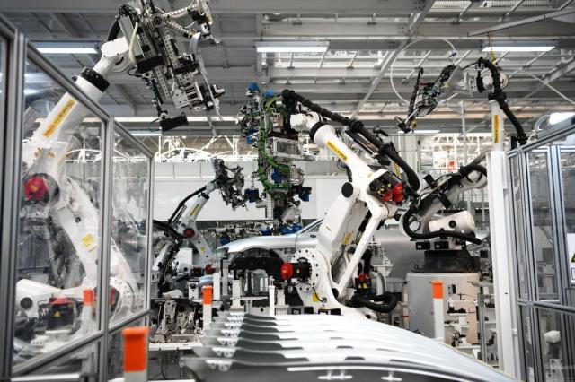 Robots at work in an assembly line in Xiaomis automobile factory Courtesy of Xiaomi