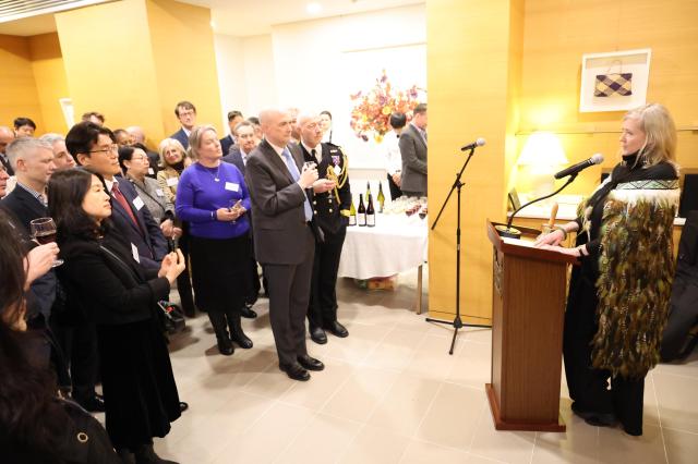 Dawn Bennet right  the New Zealand Ambassador to the Republic of Korea wearing the traditional Māori cape Kākahu Korowai greets guests during a reception held to commemorate Waitangi Day the countrys national day at the ambassadors residence in Yongsan District on February 6 AJP Han Jun-gu