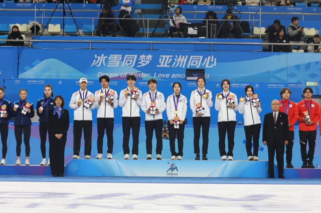 South Korean athletes pose with medals after winning the mixed 2000m relay event at the Heilongjiang Ice Training Center in Harbin China during the 2025 Asian Winter Games Thursday Feb 8 2025 Yonhap