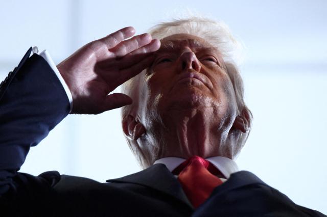 S President Donald Trump salutes before a Superbowl game in Louisiana Feb 9 2025 Reuters-Yonhap