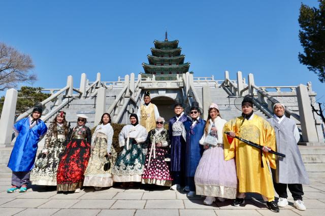 Visitors dress traditional Korean hanbok at the National Folk Museum of Korea AJP Han Jun-gu