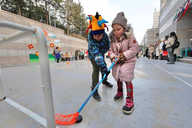 Students of the Russian school in Seoul participate in a hockey game during the traditional Russian spring festival Meslenitsa held at the Russian Embassy in the Republic of Korea on February 28 AJP Han Jun-gu