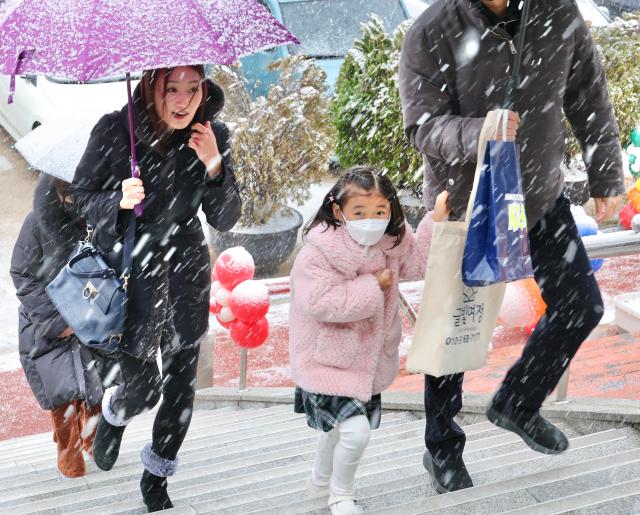 Children and parents arrive for the entrance ceremony at Ahyun Elementary School in Mapo Seoul Oct 4 2024 AJP Han Jun-gu