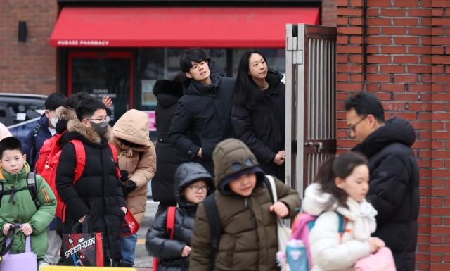 Parents watch their children going to school at Ahyun Elementary School in Mapo Seoul Oct 4 2024 AJP Han Jun-gu