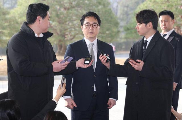 Prosecutor General Shim Woo-jung talks to reporters as he arrives at the Central District Prosecutors Office in southern Seoul on March 10 2025 Yonhap