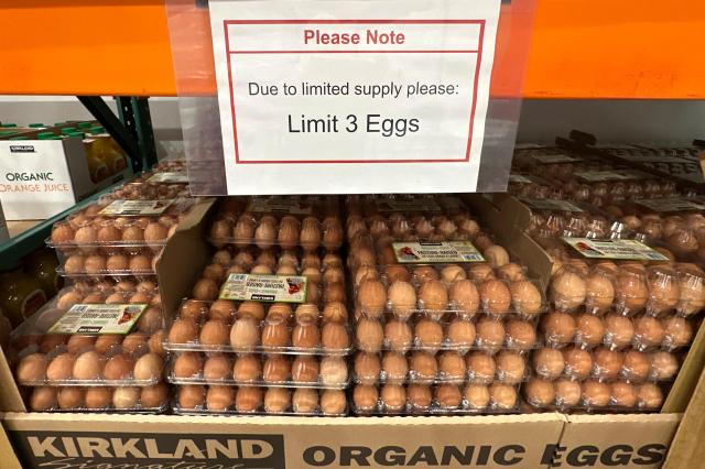 A limit sign hangs over a display of eggs in a Costco warehouse March 13 2025 Sheridan Colo AP-Yonhap