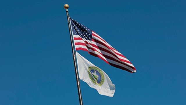 The US and Department of Energy flags are seen outside DOE headquarters in Washington DC on Feb14 2025 AFP-Yonhap