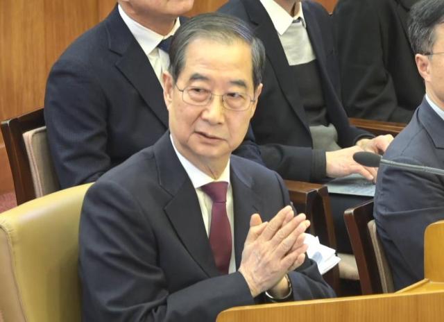 Prime Minister Han Duck-soo speaks as a witness during the 10th hearing of President Yoon Suk Yeols impeachment trial at the Constitutional Court in Jongno District Seoul on Mar 20 COurtesy of the Constitutional Court