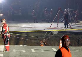 PHOTOS: Man found dead after being swallowed by massive sinkhole in Seoul