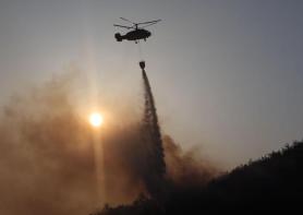 Military battles unidentified wildfire in DMZ near Goseong