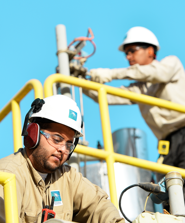Saudi Aramco employees at work Courtesy of Saudi Aramco