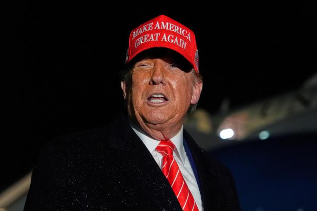 US President Donald Trump speaks to reporters in the rain after arriving on Air Force One at Joint Base Andrews Md May 30 2025 AP-Yonhap