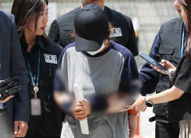 [포토] 남편 명의 대리투표 선거사무원 영장실질심사