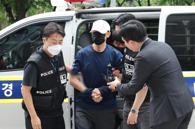 Court weighs detention of subway arson suspect as probe continues