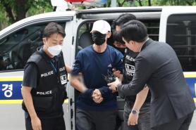 Court weighs detention of subway arson suspect as probe continues