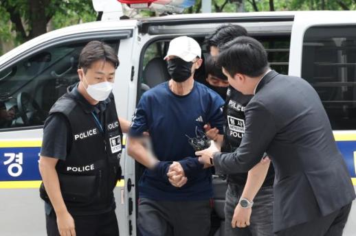 Court weighs detention of subway arson suspect as probe continues