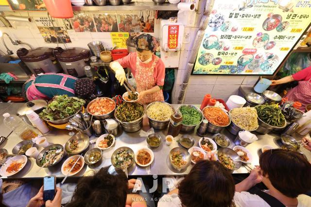 Barley rice ingredients displayed at Kalguksu Alley in Namdaemun Market Seoul May 26 2025 AJP Han Jun-gu