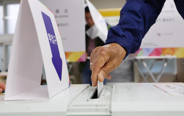 PHOTOS: People visit poll booths to vote for new president