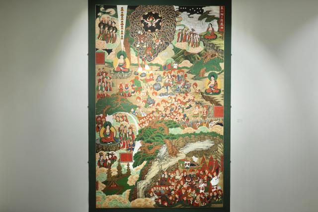 This photograph shows artist Jeong Ha-yuls Buddhist painting Subjugation of Demons displayed at Moowoosoo Gallery in Seoul on June 17 AJP Han Jun-gu