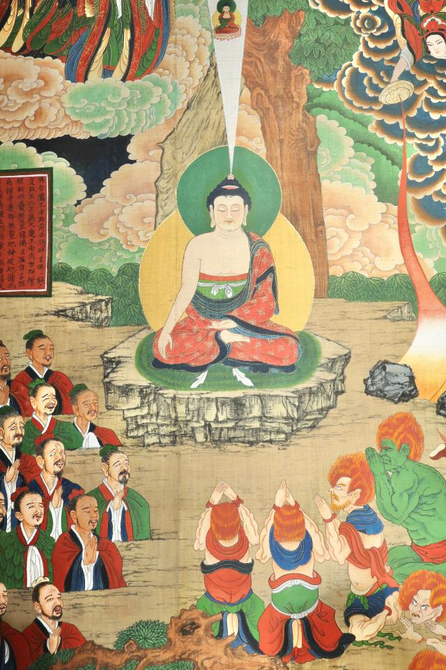 This photograph shows artist Jeong Ha-yuls Buddhist painting Subjugation of Demons displayed at Moowoosoo Gallery in Seoul on June 17 AJP Han Jun-gu