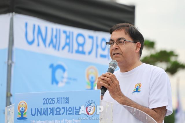 Indian Ambassador to Seoul Amit Kumar delivers a speech at the 11th International Day of Yoga event held at Gwanghwamun Square in central Seoul on June 21 2025 AJP Han Jun-gu