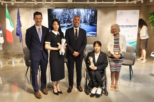 From left TV personality Alberto Mondi Olympic gold medalist Kim Yuna Andrea Varnier CEO of the Milano Cortina 2026 Organizing Committee Paralympic cross-country skier Kim Yoon-ji and Emilia Gatto Italian Ambassador to the Republic of Korea pose for a photo during the Milano Cortina 2026 Media Day event in Seoul on June 25 AJP Han Jun-gu