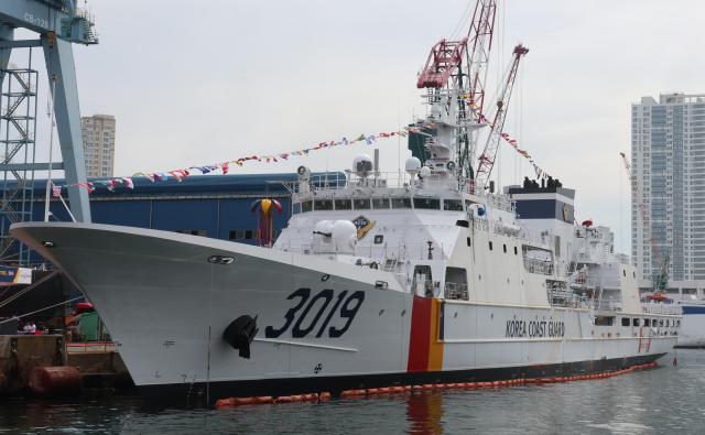 A new Korea Coast Guard patrol vessel is launched at HJ Shipbuilding Construction’s Yeongdo Shipyard in Busan on June 12 South Korea’s shipbuilding industry alongside semiconductors is expected to be among the biggest beneficiaries of the sweeping US economic legislation known as OBBBA Yonhap