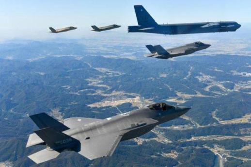 South Korea, Japan and US conduct aerial drill as defense chiefs meet