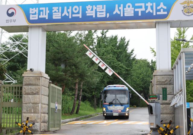 A justice ministry vehicle departs from Seoul Detention Center in Uiwang Gyeonggi Province on July 15 2025 Yonhap