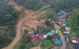 Torrential rains leave dozens dead or missing, thousands displaced