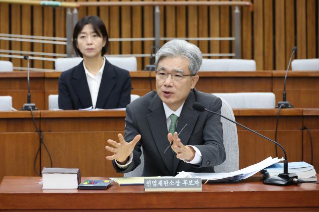 김상환 헌법재판소장 후보자가 지난 21일 국회에서 열린 인사 청문회에서 의원 질의에 답하고 있다 사진연합뉴스